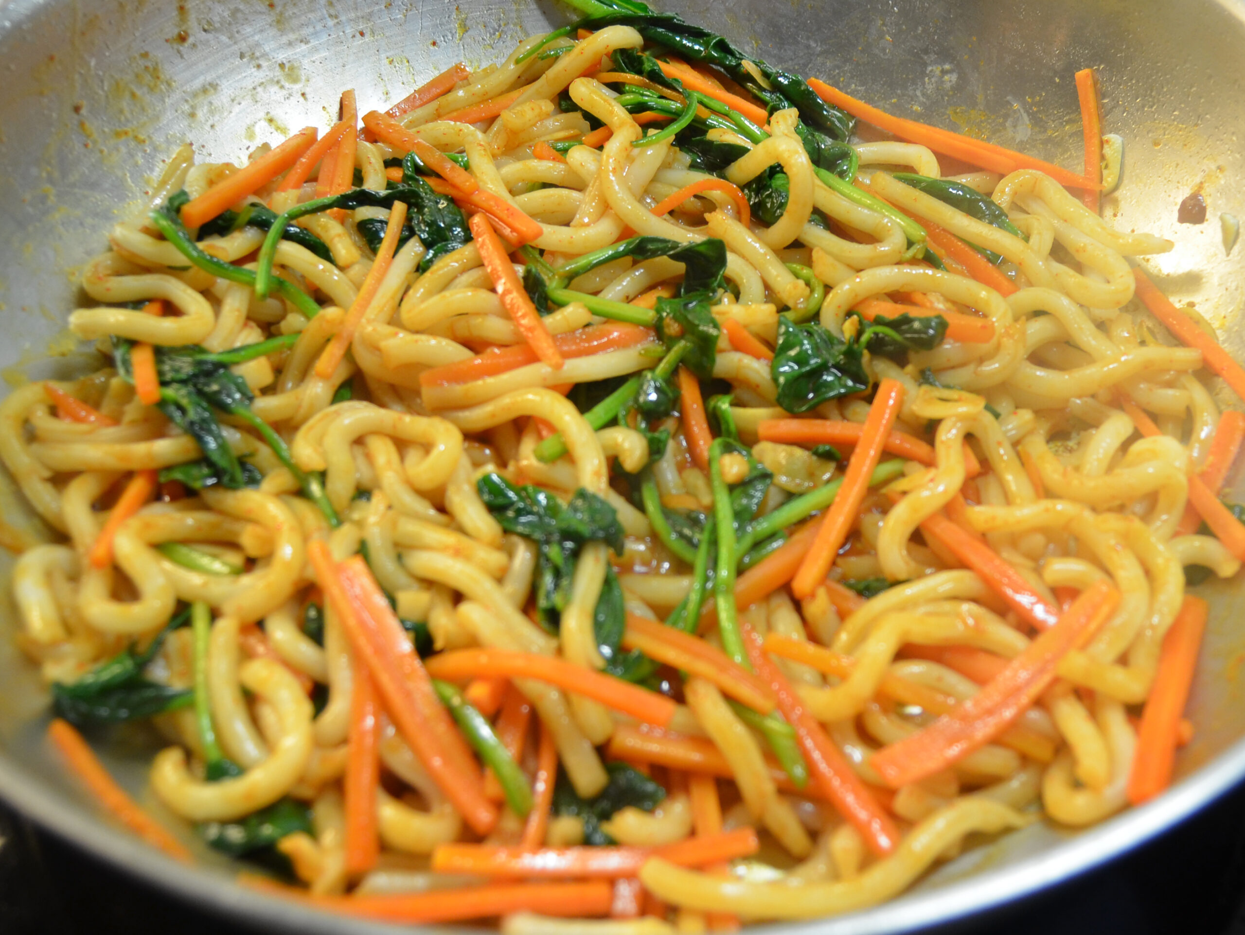 Noodles added to the skillet