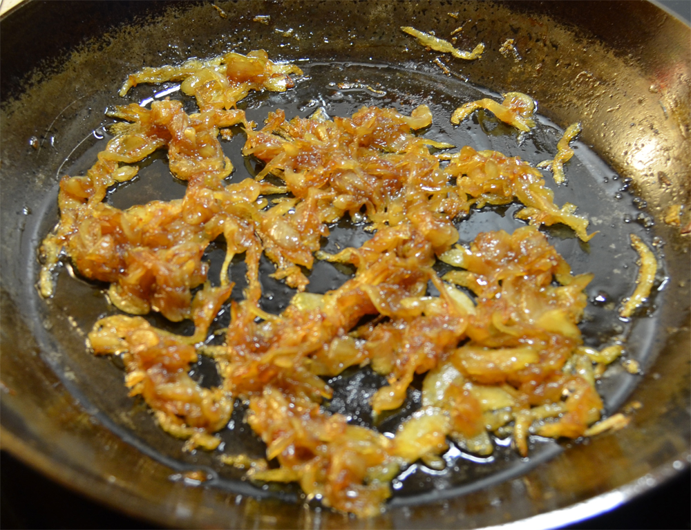 Caramelized onions in a skillet.