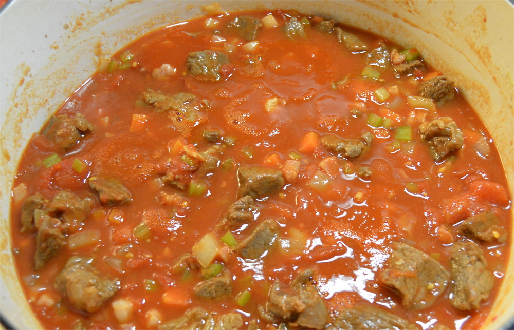 Beef, pancetta and vegetables in tomato sauce.